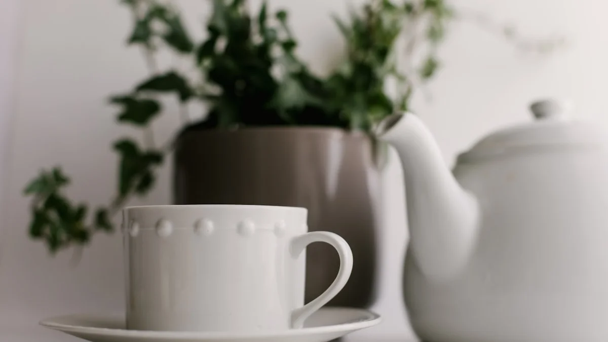 A white teacup and teapot resting beside an ivy plant in soft window light, a pause before answering - a Quiet Core Reset guide to 8 Signs You Keep Saying Yes When You Mean No.