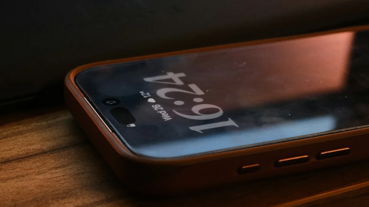 A smartphone showing the time lies on a wooden desk beside a keyboard in warm low light - a Quiet Core Reset guide to Attention Residue.