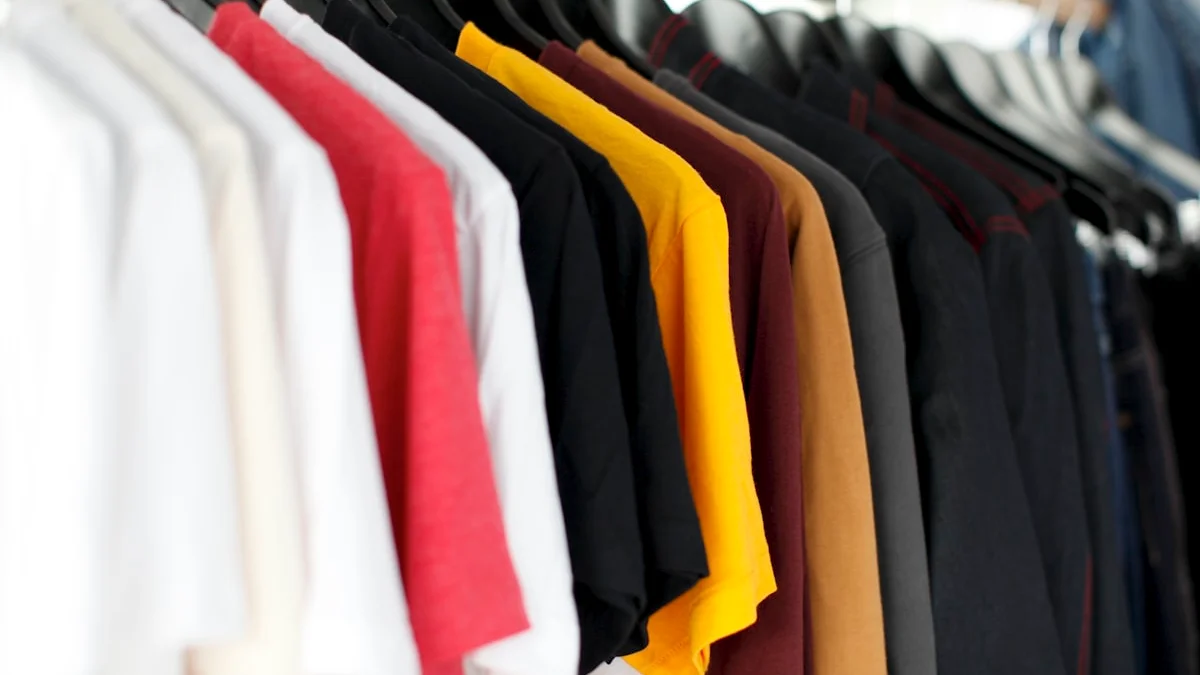 A full clothing rack under soft morning light with more options than the day needs - a Quiet Core Reset guide to decision fatigue and why small choices drain your energy.
