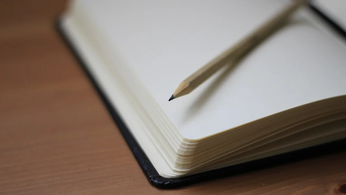 An open notebook and sharpened pencil waiting on a warm wooden desk - a Quiet Core Reset guide to The Core Energy Self-Assessment Template (Free Download).