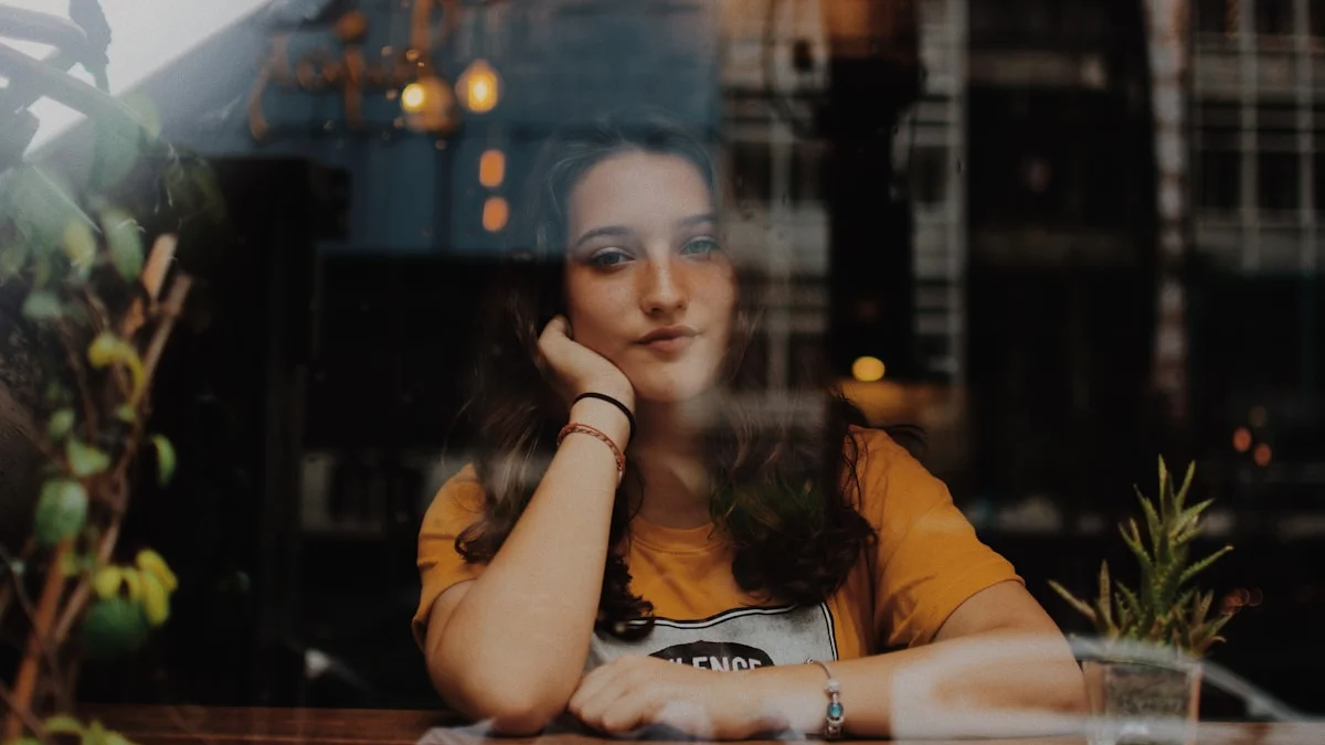 A composed woman resting her chin on her hand at a warm cafe window, seen through the glass - a Quiet Core Reset guide to High-Functioning Exhaustion: 11 Signs You're Disappearing.
