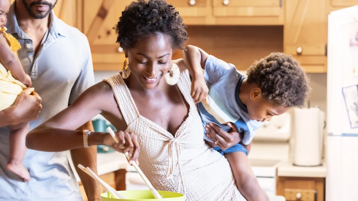 A parent stirring a pot in the kitchen with two children gathered close around her - a Quiet Core Reset guide to Hustle Culture for Parents: When "Doing It All" Is the Lie.