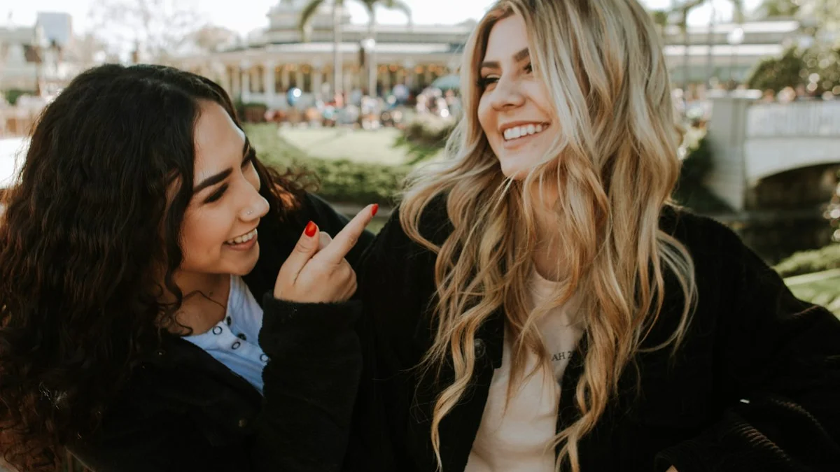 Two friends laugh together outdoors in warm sunlight - a Quiet Core Reset guide to 6 Myths About Boundaries, Debunked.