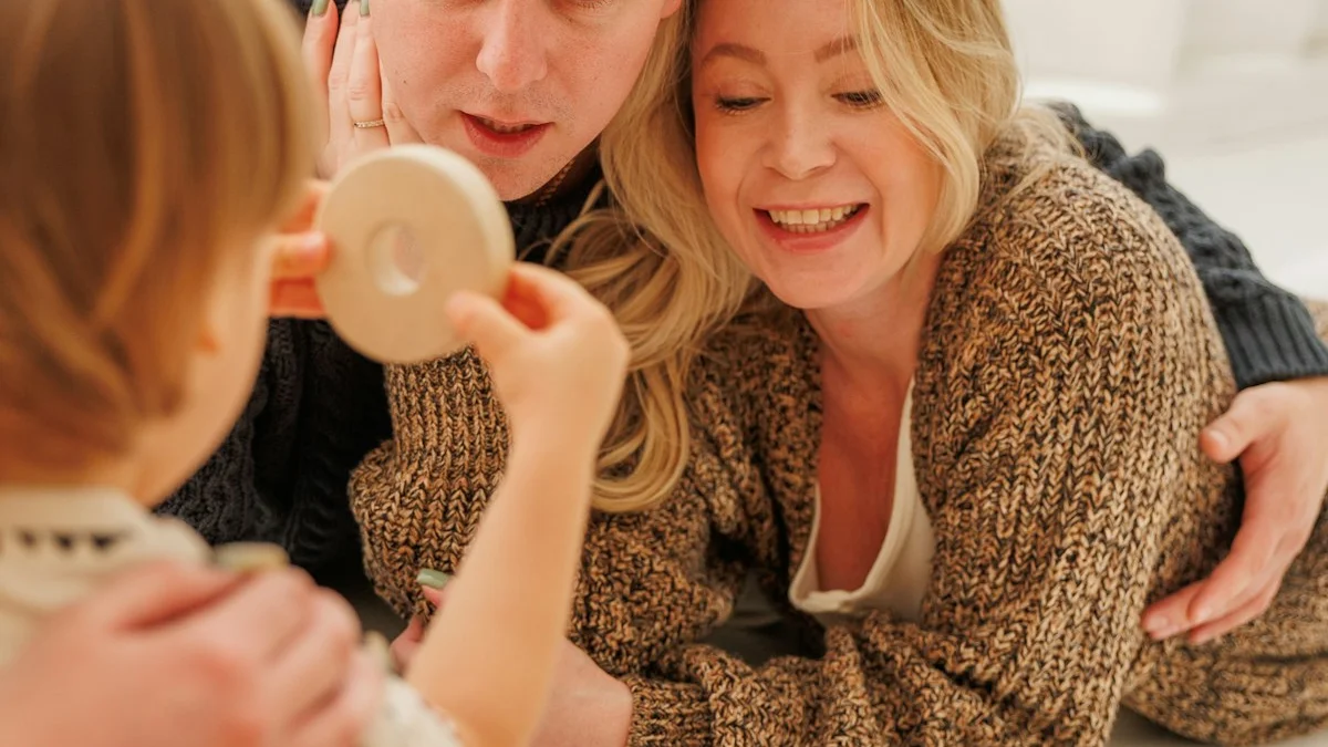 A mother and father lying on the living-room floor playing with their small child - a Quiet Core Reset guide to Parental Comparison: When Other Families Look Perfect.