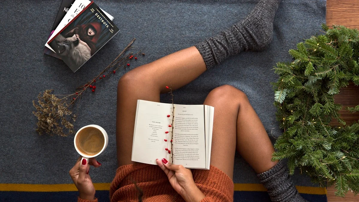 A person stretched out on a rug with an open book and a mug of coffee, the phone left in another room - a Quiet Core Reset guide to Physical Distance Practice.