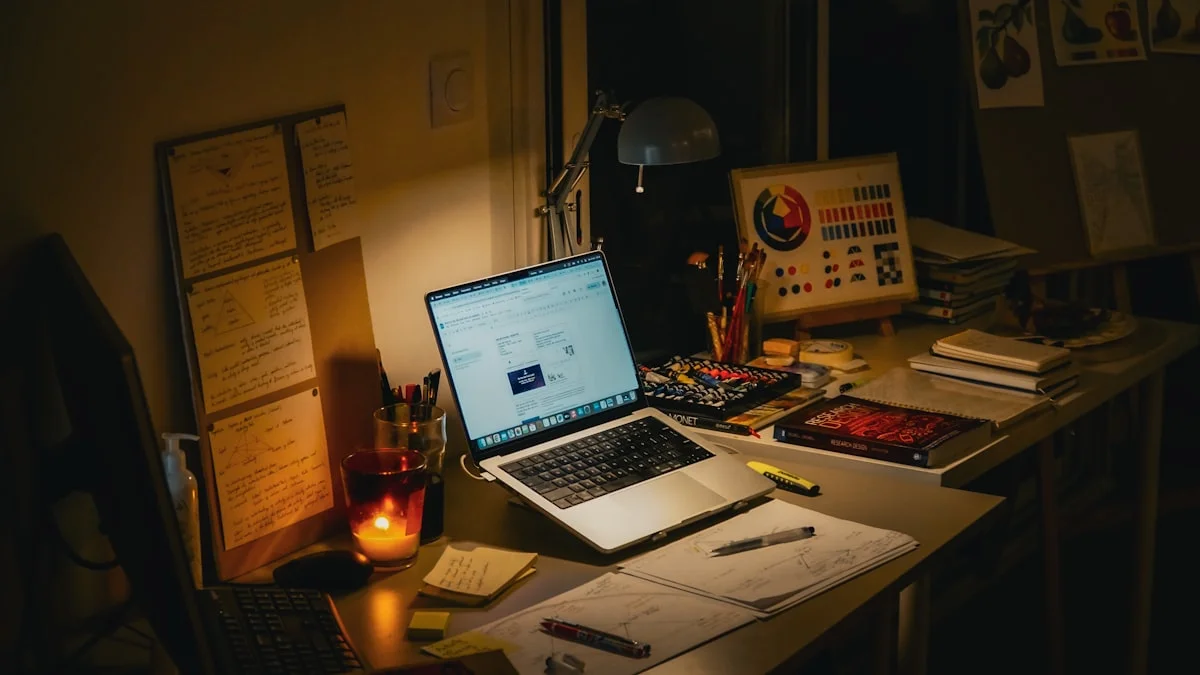 A dim desk lit by a single candle and a glowing laptop late at night - a Quiet Core Reset guide to Quiet Exhaustion: The Hidden Cost of High-Functioning.