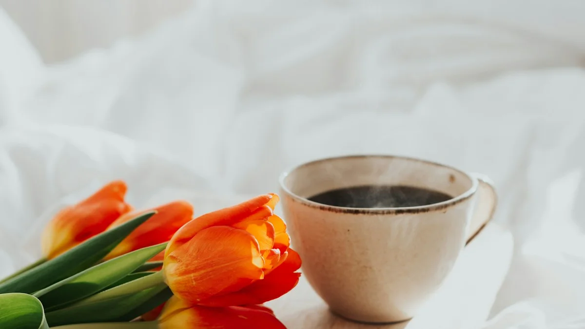 Orange tulips and a steaming cup of coffee on a wooden board across a white bed - a Quiet Core Reset guide to Reclaiming Your Yes.