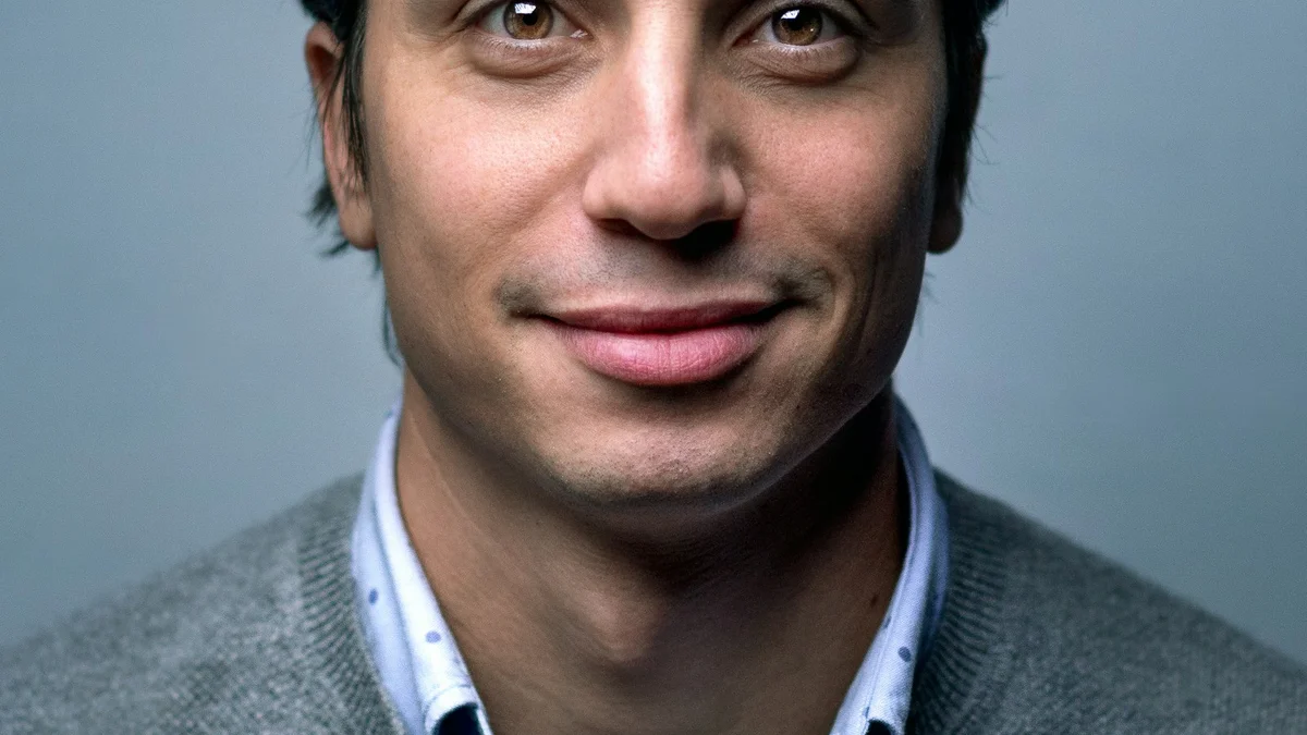 A close-up portrait of a man smiling gently, warm and approachable - a Quiet Core Reset guide to How to Set Boundaries When You've Never Had Them.