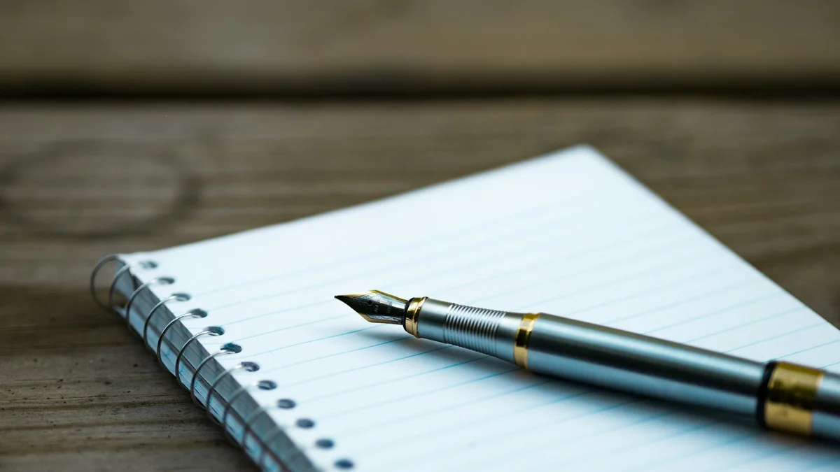 A fountain pen resting on an open lined notebook on a wooden desk - a Quiet Core Reset guide to Sleep Recovery Checklist.