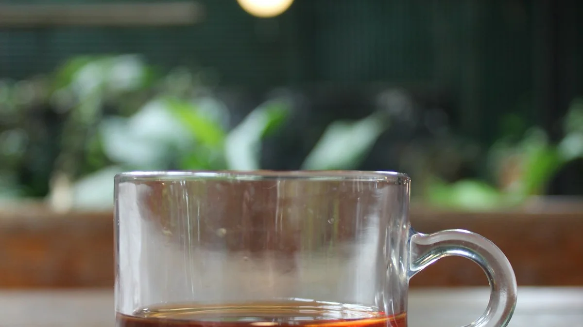 A single glass mug of tea on a wooden table in soft window light, one small ordinary pause - a Quiet Core Reset guide to Slow Living When You're Already Burned Out: Start Smaller.