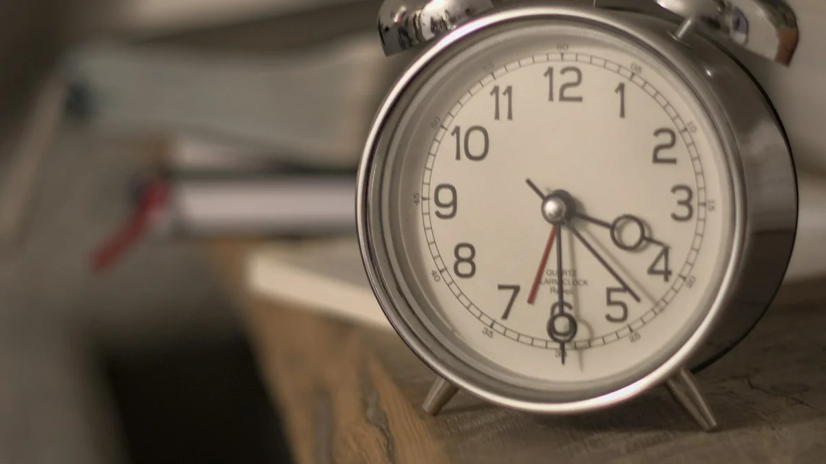 A vintage twin-bell alarm clock resting on a wooden ledge, as if ringing without end - a Quiet Core Reset guide to What Is a Dysregulated Nervous System? Is It Permanent?.